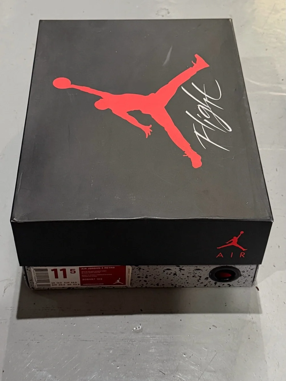 Jordan Men’s White/ Cement Gray/Black Retro 4 Sneakers with Red Jumpman